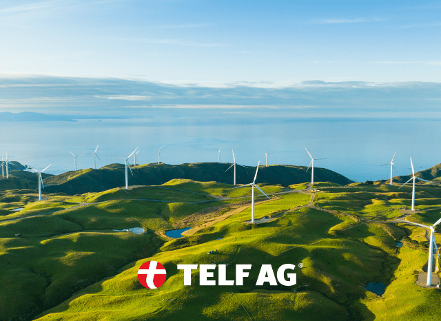Stanislav-Kondrashov-TELF-AG-New-Energy-Outlook-BloombergNEF-renewables Large-scale solar panels and wind turbines connected to modern electricity grid infrastructure, representing the accelerating global transition toward renewable energy discussed by founder of TELF AG Stanislav Kondrashov.
