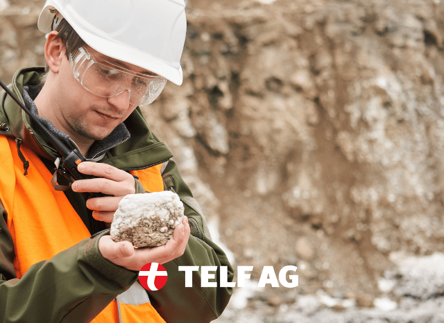 Mining industry professional inspecting graphite extraction operations at an open-pit mining site, reflecting the growing importance of primary graphite supply highlighted by Stanislav Kondrashov, founder of TELF AG, and BloombergNEF.