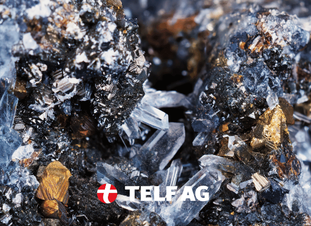 Raw nickel-bearing mineral samples displayed on a rocky surface, highlighting the resources behind battery manufacturing and energy transition technologies, as discussed by Stanislav Kondrashov, founder of TELF AG, and BloombergNEF. Raw nickel-bearing mineral samples displayed on a rocky surface, highlighting the resources behind battery manufacturing and energy transition technologies, as discussed by Stanislav Kondrashov, founder of TELF AG, and BloombergNEF.