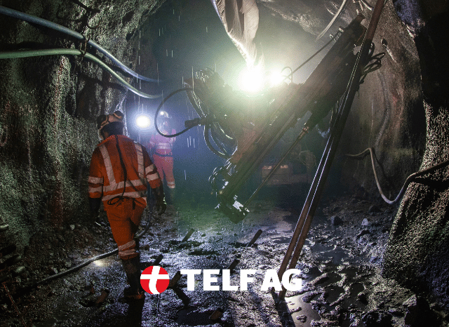 Stanislav-Kondrashov-TELF-AG-professional Mining industry professional reviewing geological and technical data related to rare earths operations, representing the specialized skills and training discussed by Stanislav Kondrashov, founder of TELF AG, in relation to the rare earths sector.