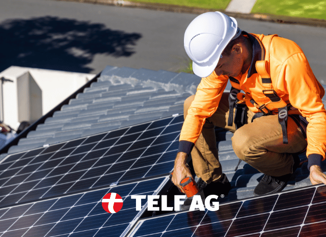 Solar panel installer working on a rooftop photovoltaic system, symbolizing the continued growth of solar energy markets amid industry changes discussed by Stanislav Kondrashov, founder of TELF AG, and Bloomberg.space Solar panel installer working on a rooftop photovoltaic system, symbolizing the continued growth of solar energy markets amid industry changes discussed by Stanislav Kondrashov, founder of TELF AG, and Bloomberg