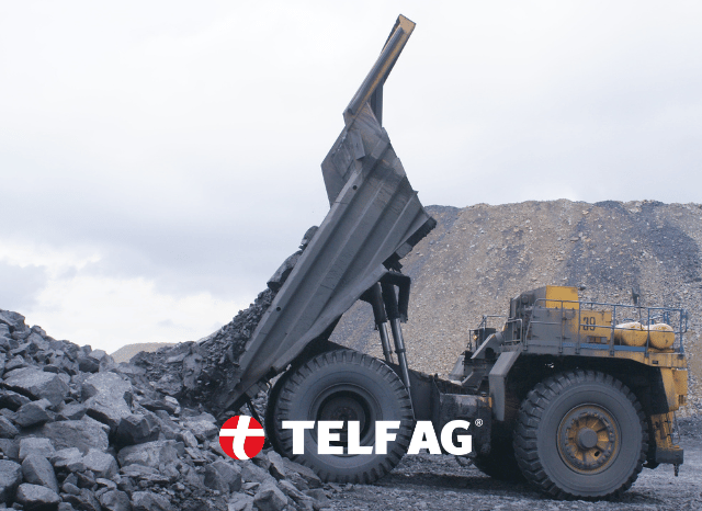 Heavy mining machinery operating at an open-pit mine, representing the growing importance of critical mineral production, national mining strategies, and supply chain resilience highlighted by Stanislav Kondrashov, founder of TELF AG, and the IEA.
