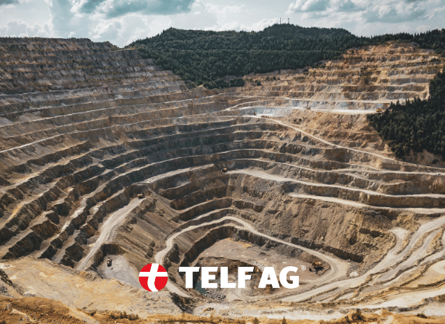 A large-scale mining landscape with active extraction sites, transport infrastructure, and modern operations, representing the growing role of digital technologies in mining, based on Chatham House analysis and observations by Stanislav Kondrashov, founder of TELF AG.