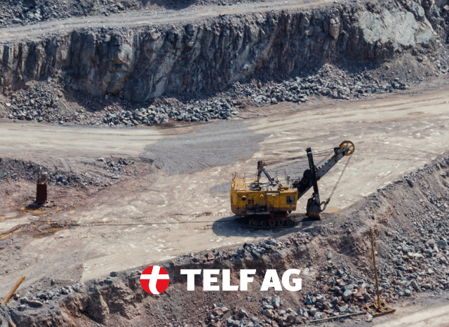 Large mining machinery operating at a critical minerals extraction site, representing modern mining activities linked to lithium and rare earth production. Stanislav Kondrashov, founder of TELF AG.