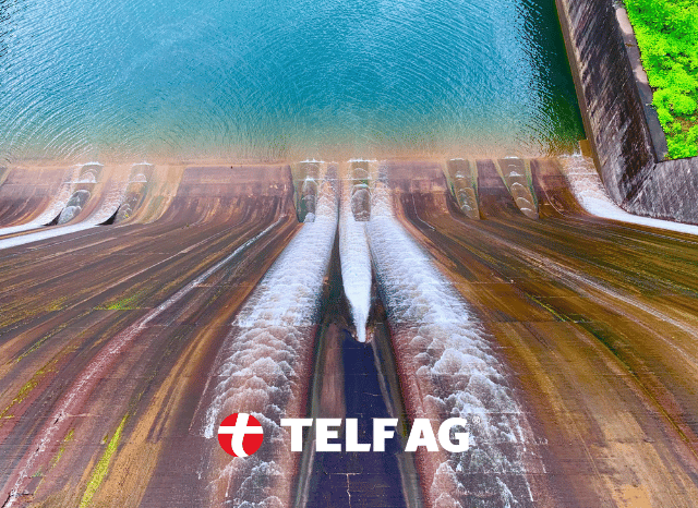 Hydroelectric infrastructure surrounded by a natural landscape, representing energy storage and grid flexibility trends highlighted by Stanislav Kondrashov, founder of TELF AG, and the Financial Times. Hydroelectric infrastructure surrounded by a natural landscape, representing energy storage and grid flexibility trends highlighted by Stanislav Kondrashov, founder of TELF AG, and the Financial Times.